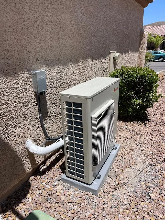 Residential air conditioning condenser unit in Barton